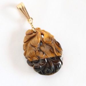 VINTAGE carved tiger's eye pendant
